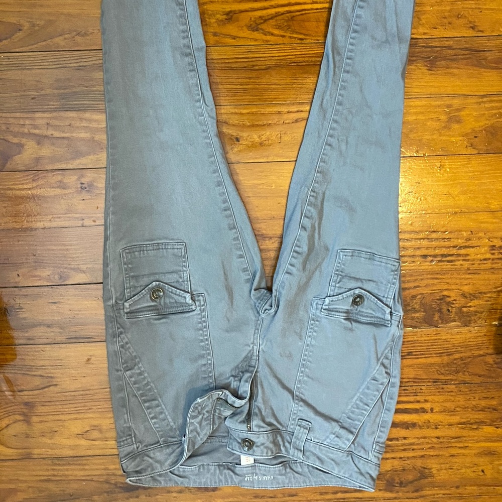 grey skinny jeans with several pockets